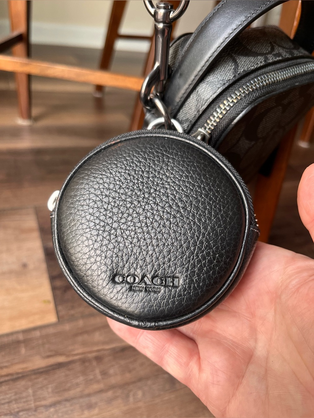 Coach Black Pebbled Leather Round Pouch with Silver Clip! 
Clip on bag!
